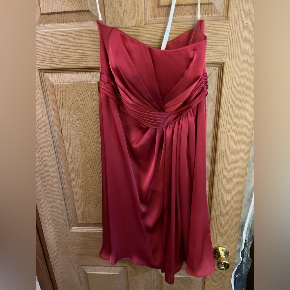 Watermelon strapless dress. Size 10. Never worn. Gages are still on